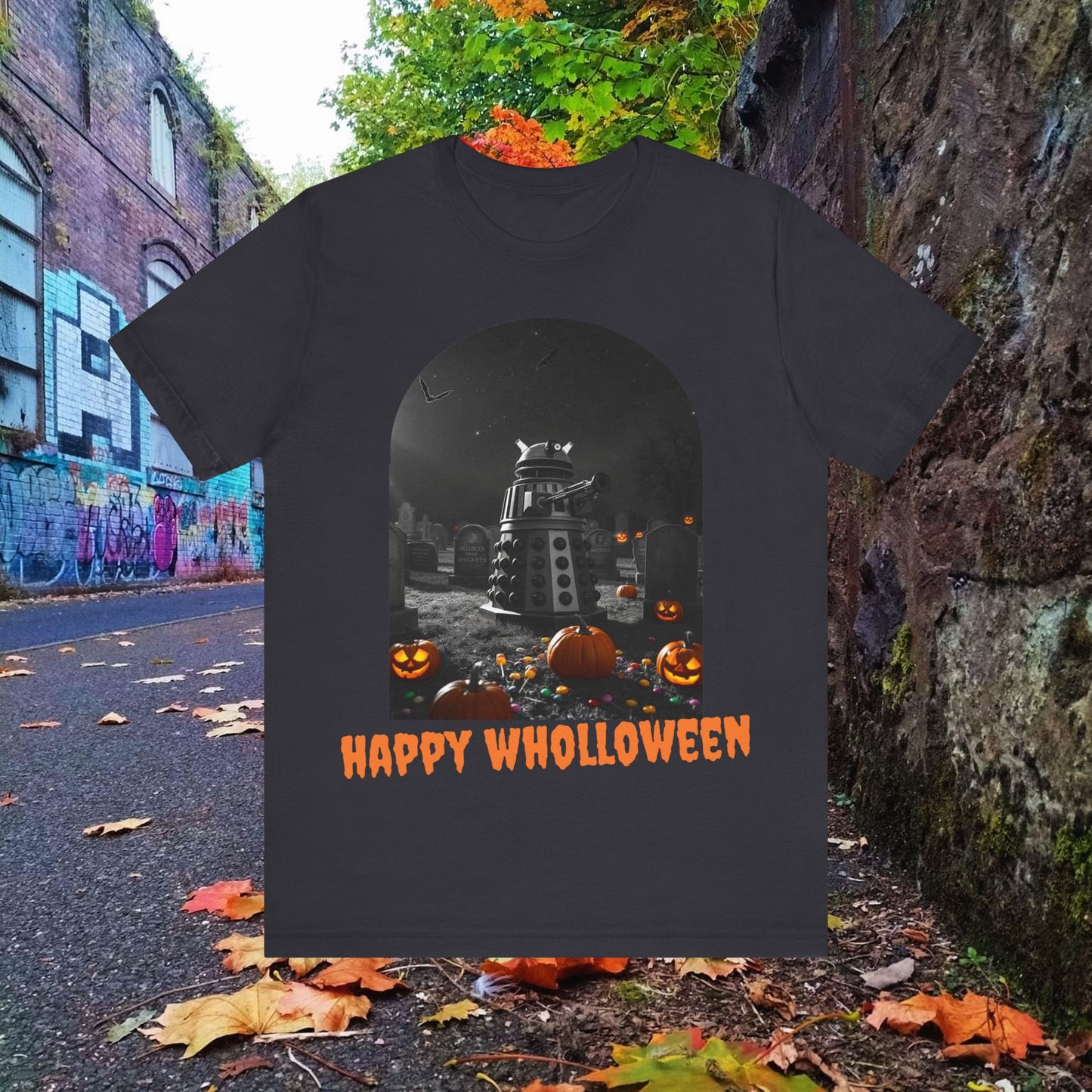 Happy Wholloween black & white Dalek with colour pumpkins in a graveyard T-shirt (Oh, and bats)