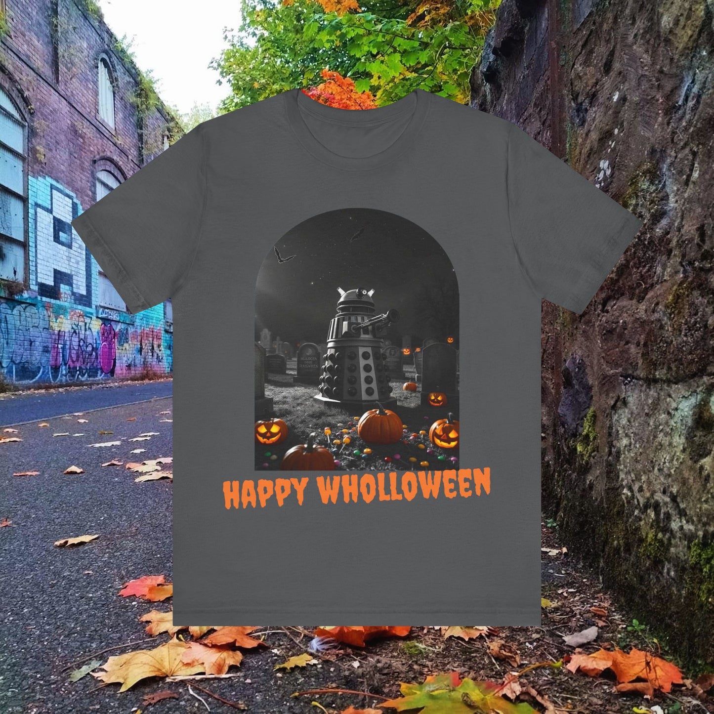 Happy Wholloween black & white Dalek with colour pumpkins in a graveyard T-shirt (Oh, and bats)